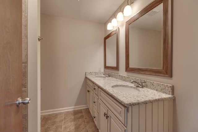 5603 Rucker Christiana Road Christiana, TN 37037 - Photo 11 of 20 Master Bath with double vanity. New cabinetry, granite, faucets and lighting.