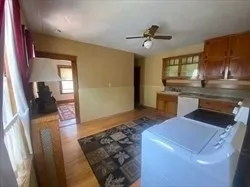 a kitchen with a sink appliances and cabinets