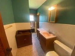 a room with furniture and a mirror