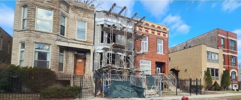 530 East 44th Place Chicago, IL 60653 - Photo 16 of 16 a city street lined with tall buildings