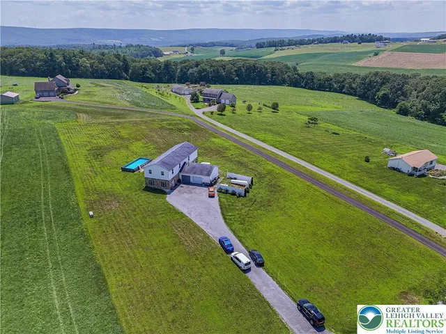 a view of a golf course with a park