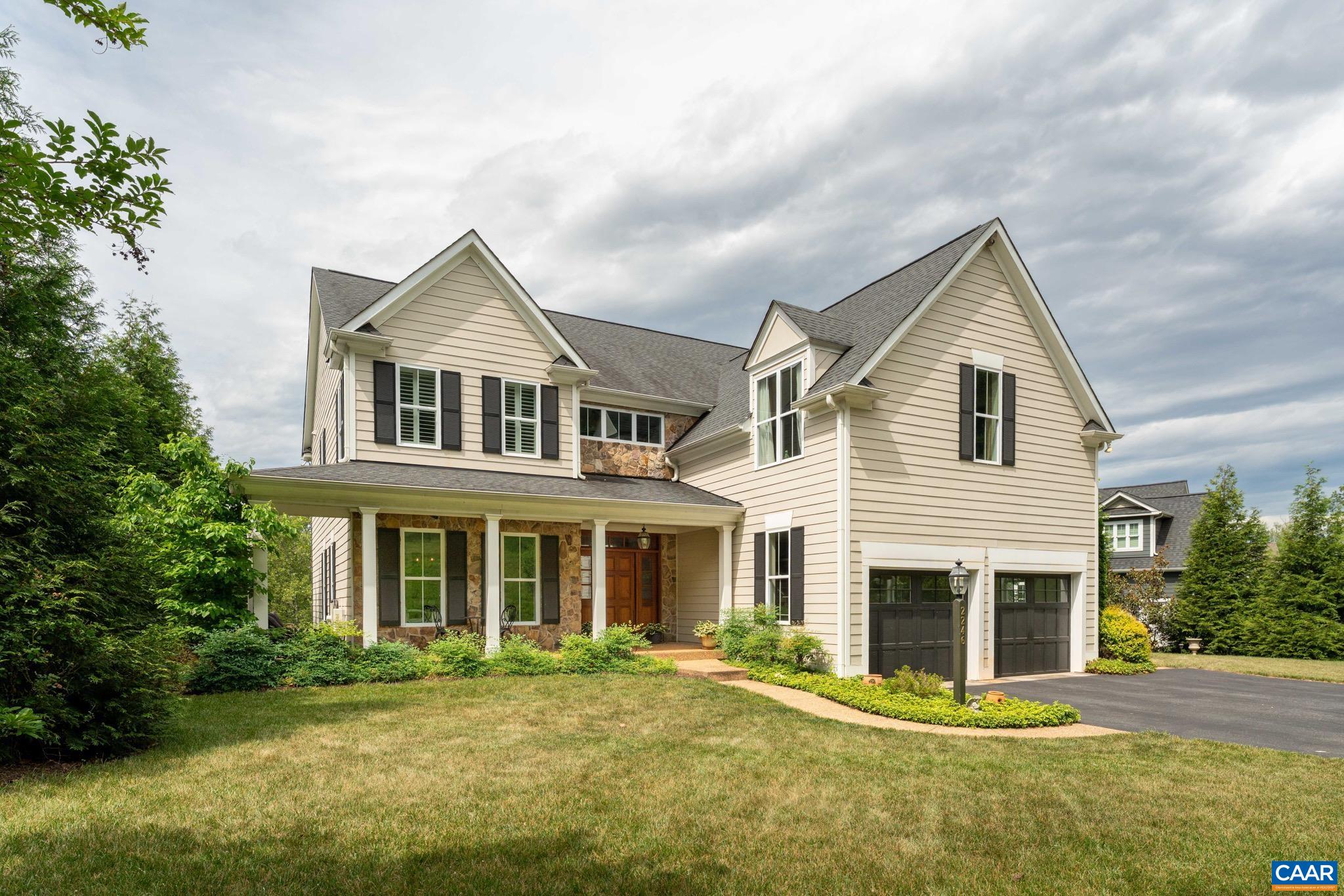 2246 Hyland Ridge Drive Charlottesville, VA 22911 - Photo 1 of 53 a front view of a house with a yard