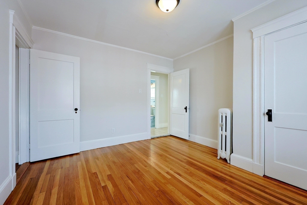 33 Woodleigh Road, Unit 2 Watertown, MA 02472 - Photo 12 of 23 a view of a room with wooden floor