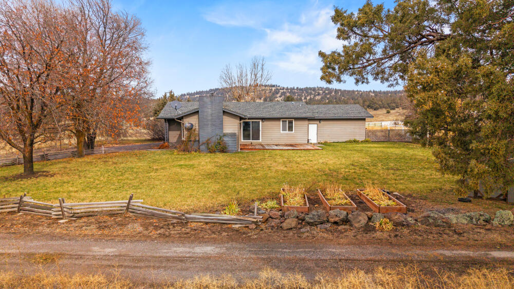 23131 North Poe Valley Road Klamath Falls, OR 97603 - Photo 7 of 45 a view of a house with a yard