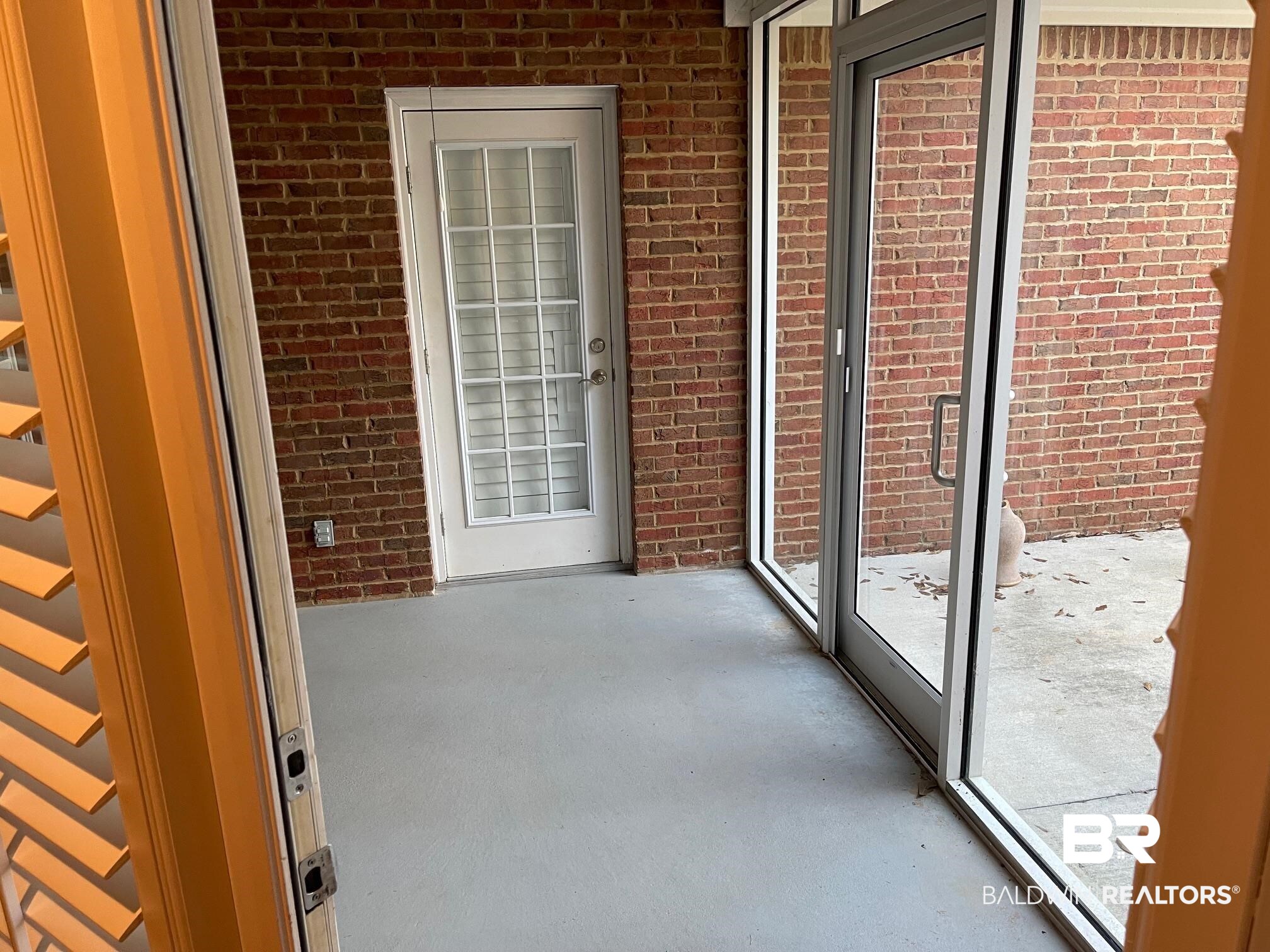 109 Savannah Circle Foley, AL 36535 - Photo 10 of 17 View of unfurnished sunroom