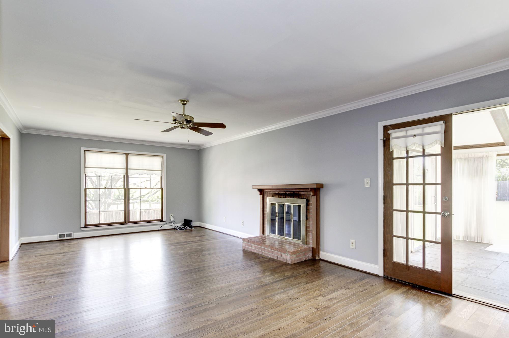 10031 Kendale Road Potomac, MD 20854 - Photo 13 of 52 Family Room looking into Sun Room