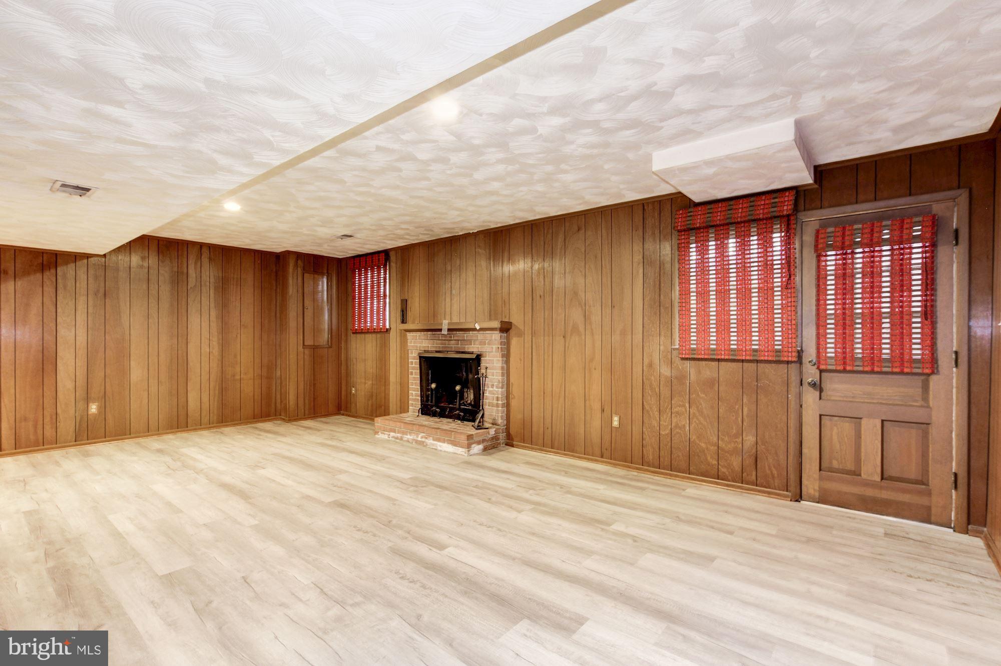 10031 Kendale Road Potomac, MD 20854 - Photo 43 of 52 Lower Level Family Room with Fireplace