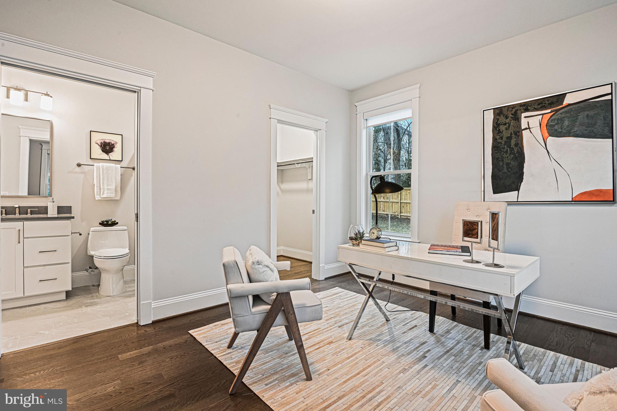 6447 Tucker Avenue McLean, VA 22101 - Photo 15 of 47 a workspace with wooden floor and a rug