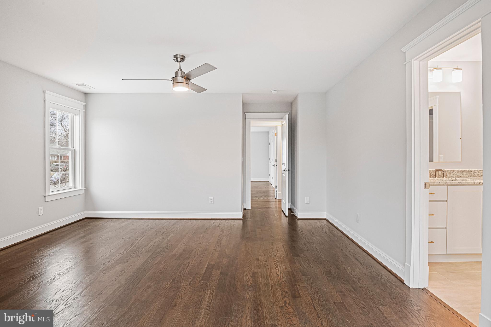 6447 Tucker Avenue McLean, VA 22101 - Photo 22 of 47 wooden floor in an empty room with a window
