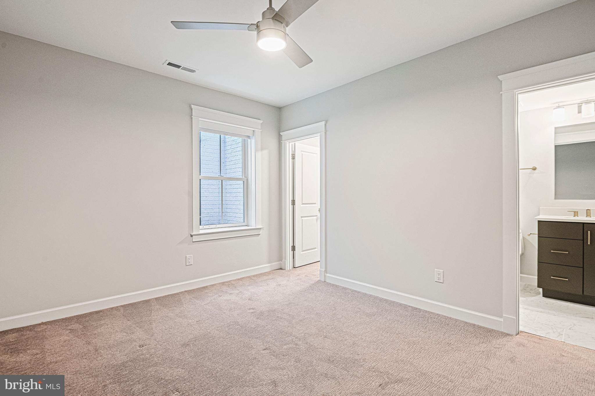 6447 Tucker Avenue McLean, VA 22101 - Photo 35 of 47 an empty room with windows and fan cabinet