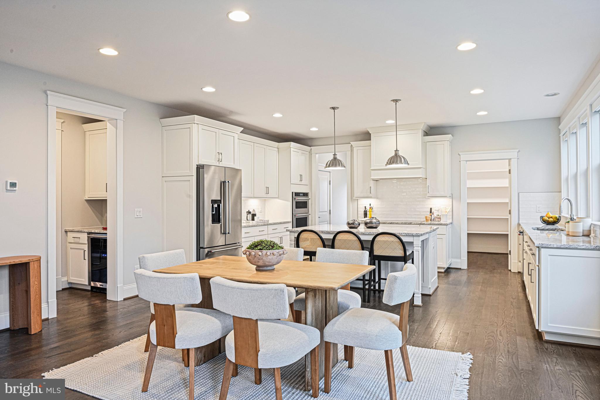 6447 Tucker Avenue McLean, VA 22101 - Photo 5 of 47 a view of a dining room with furniture and wooden floor