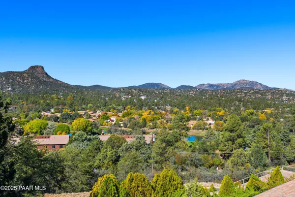 a view of a city with mountain