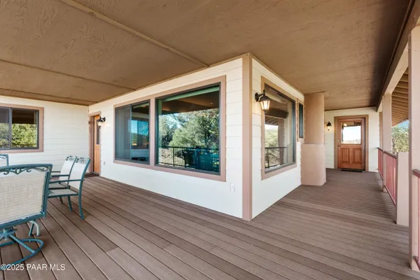 a view of a livingroom with furniture and wooden floor