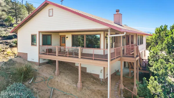 a front view of a house with a porch