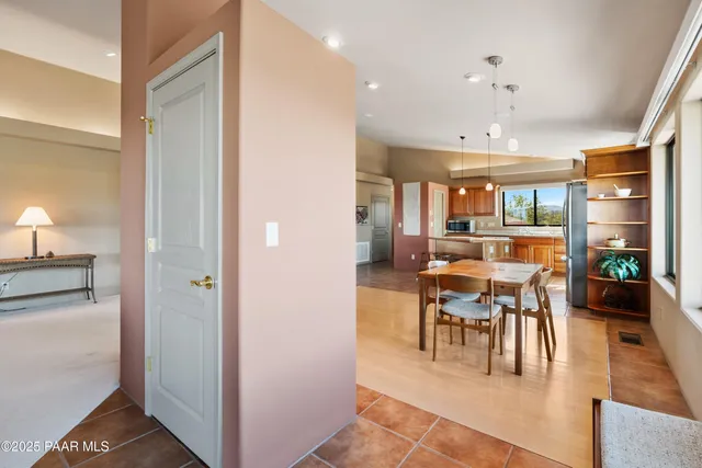 a view of a dining room with furniture