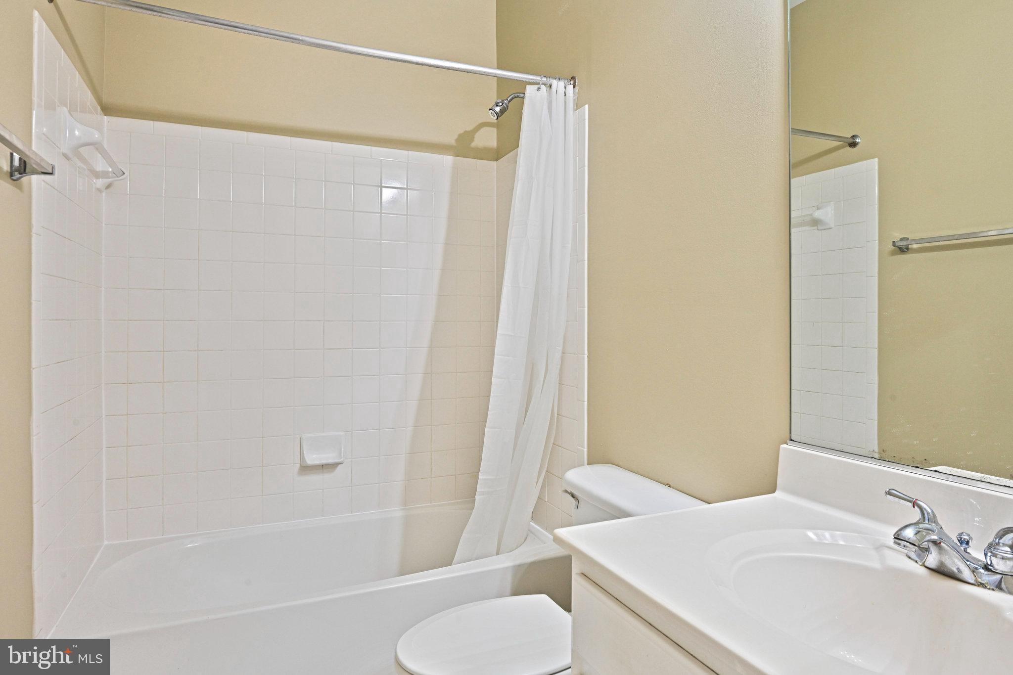 4150 Jeremy Grv Court Fairfax, VA 22030 - Photo 14 of 26 a bathroom with a sink toilet and shower