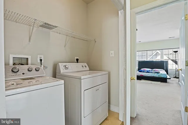 a bathroom with a sink toilet vanity and shower