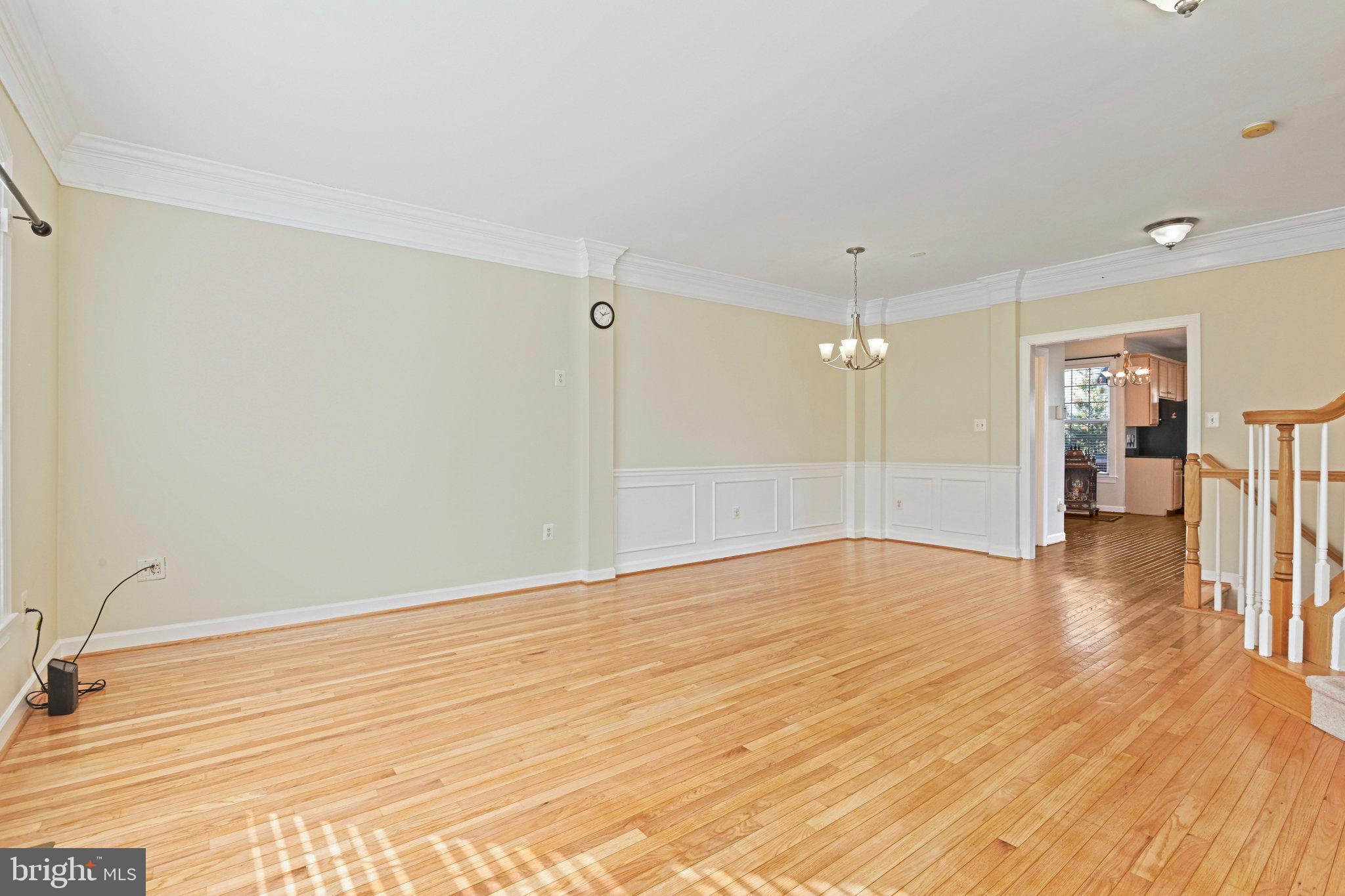 4150 Jeremy Grv Court Fairfax, VA 22030 - Photo 5 of 26 a view of empty room with wooden floor and fan