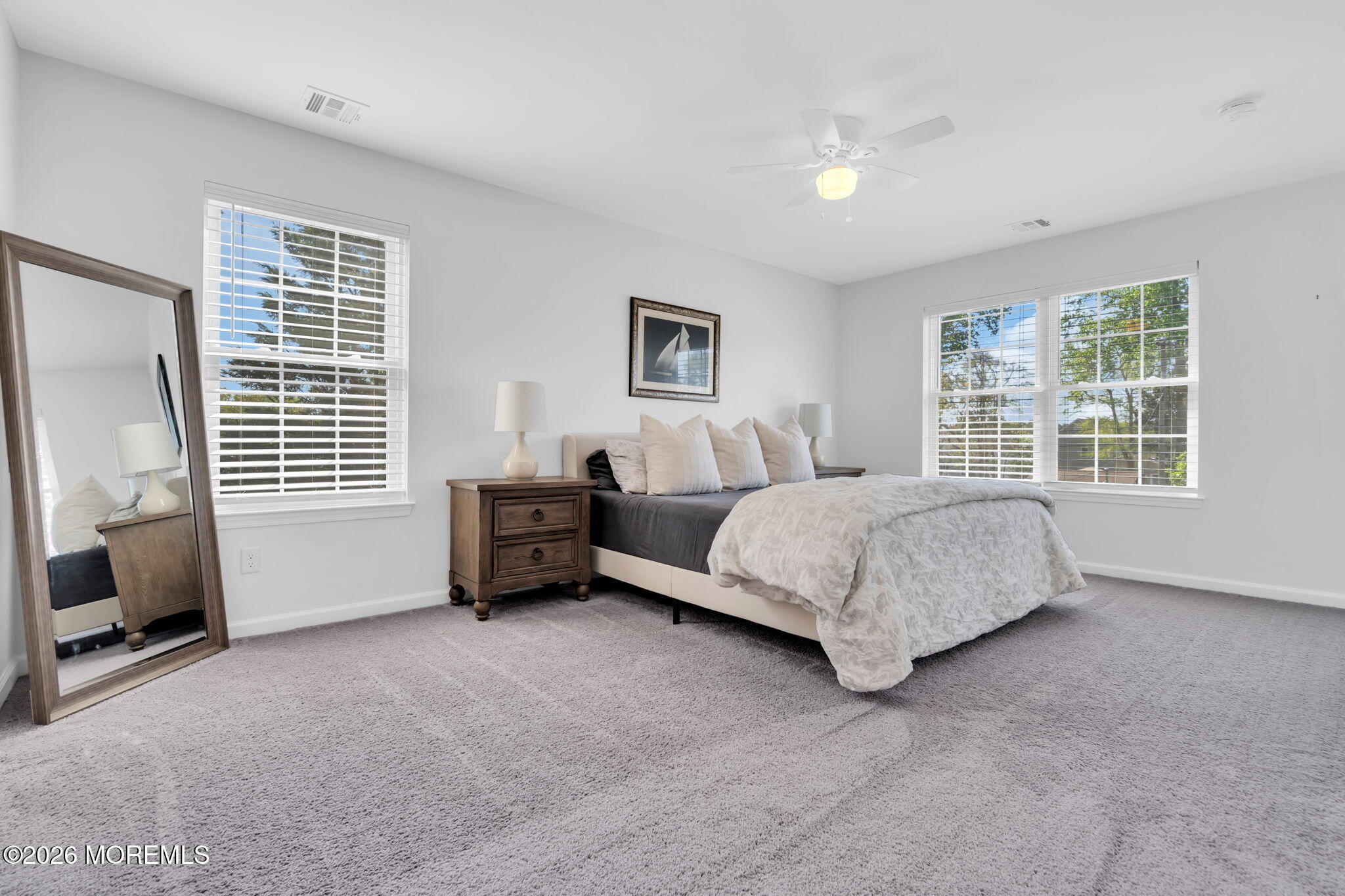 312 Beach Boulevard Forked River, NJ 08731 - Photo 28 of 40 a bedroom with a bed and a couch