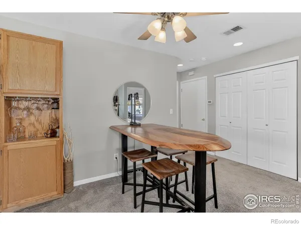 a kitchen with stainless steel appliances granite countertop a refrigerator sink and cabinets