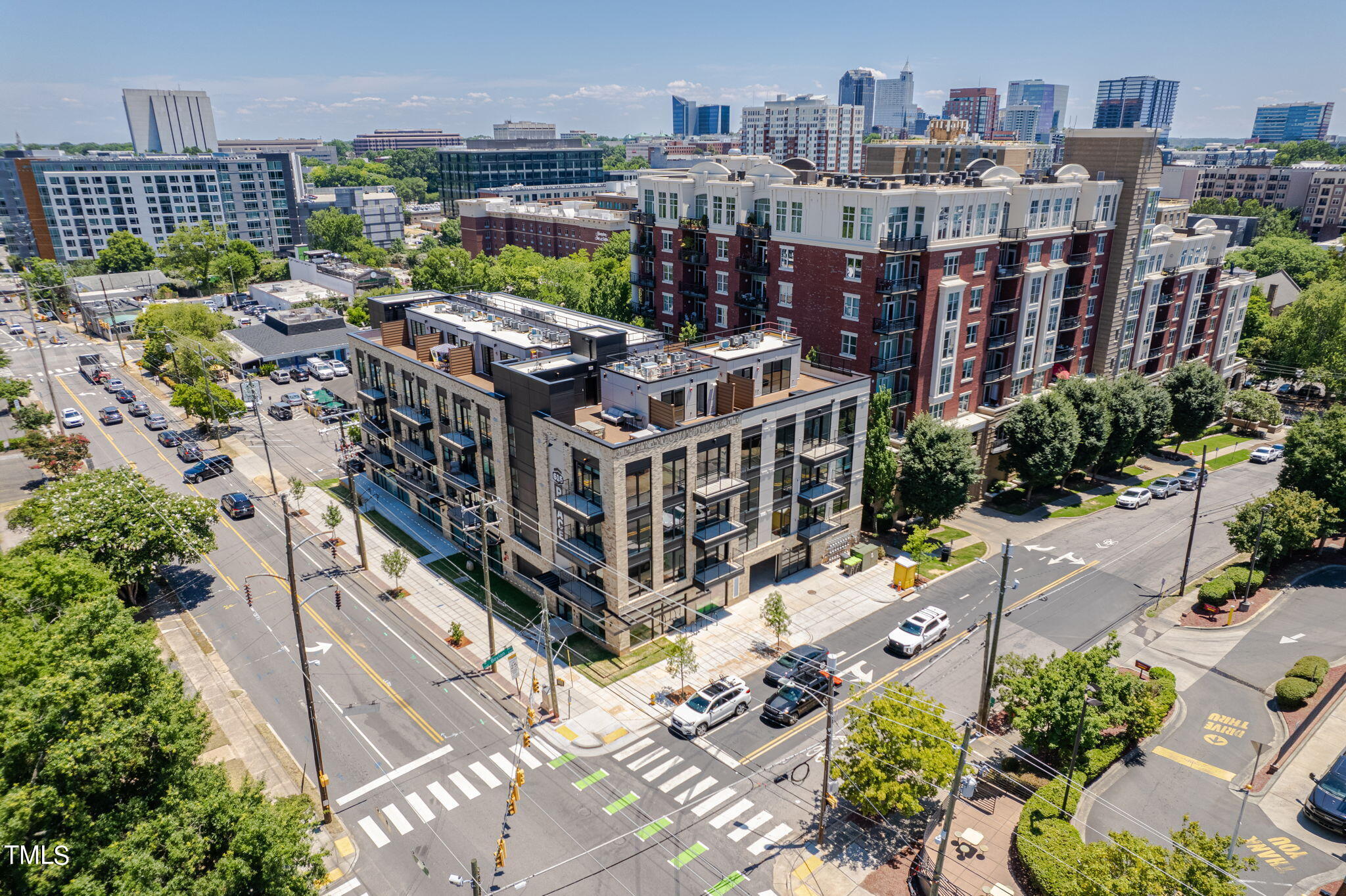 615 West Peace Street, Unit 306 Raleigh, NC 27603 - Photo 26 of 37 a view of city with tall buildings