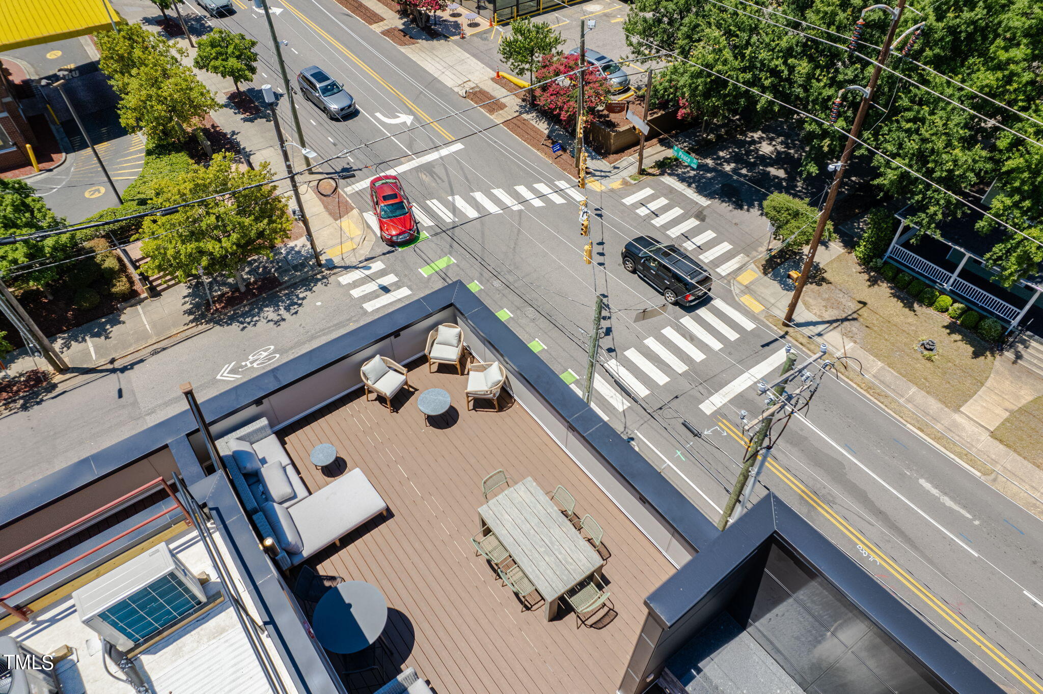 615 West Peace Street, Unit 306 Raleigh, NC 27603 - Photo 36 of 37 an aerial view of a house swimming pool patio and outdoor seating