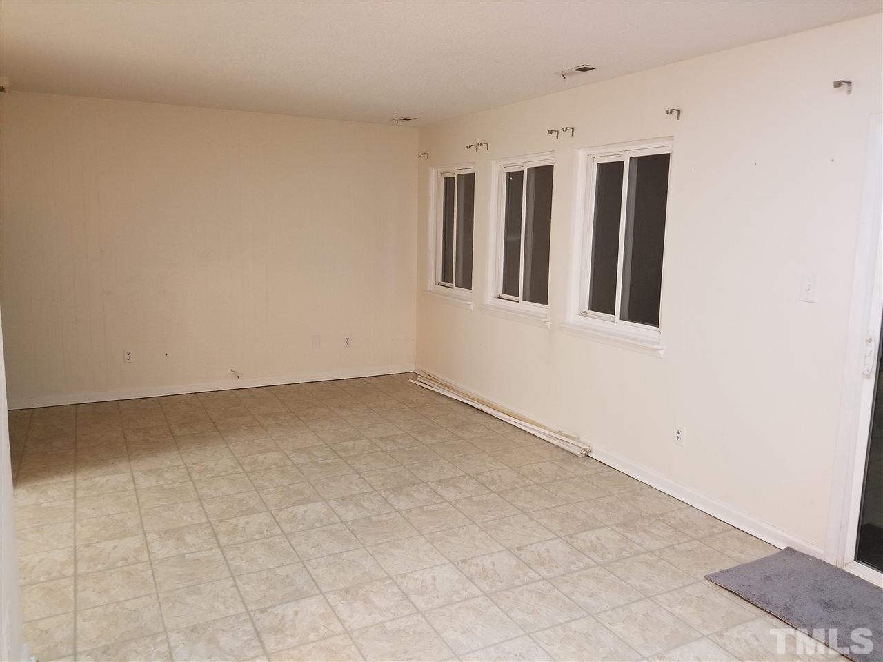5911 Farm Gate Road Raleigh, NC 27606 - Photo 14 of 21 a view of an empty room