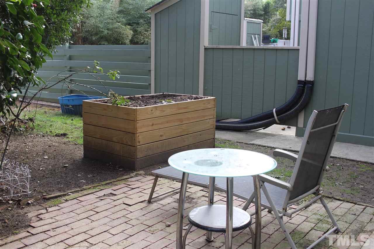 5911 Farm Gate Road Raleigh, NC 27606 - Photo 17 of 21 a outdoor space with a couch