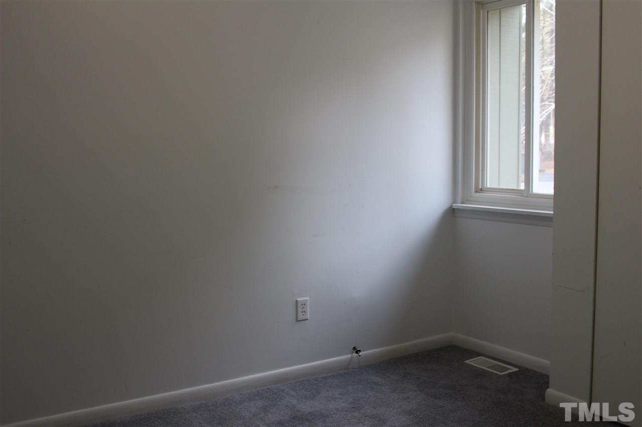 5911 Farm Gate Road Raleigh, NC 27606 - Photo 6 of 21 a small space with a window