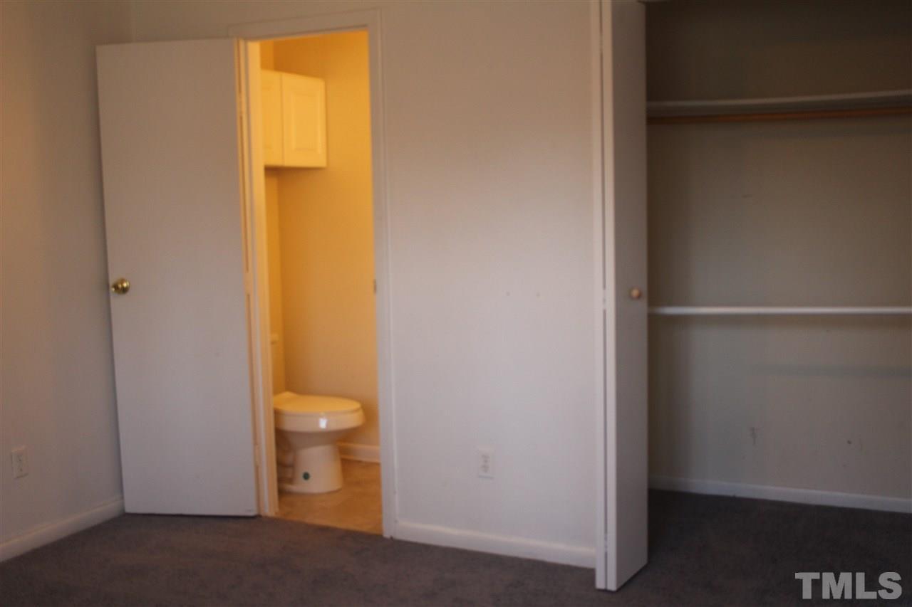 5911 Farm Gate Road Raleigh, NC 27606 - Photo 7 of 21 a bathroom view of a toilet
