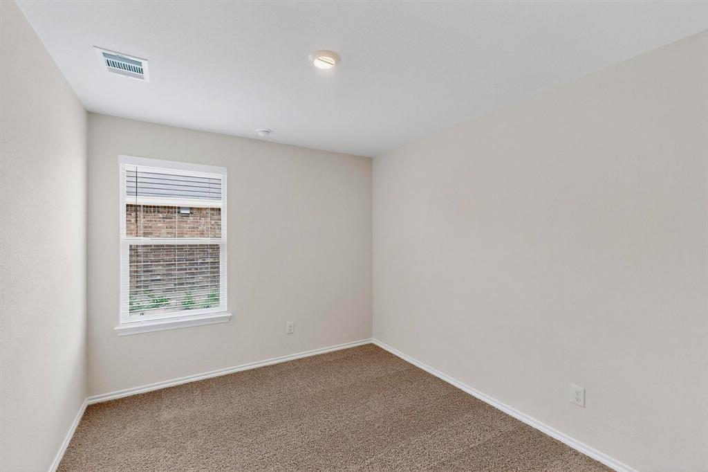 406 Regiment Road Sherman, TX 75090 - Photo 23 of 40 an empty room with windows