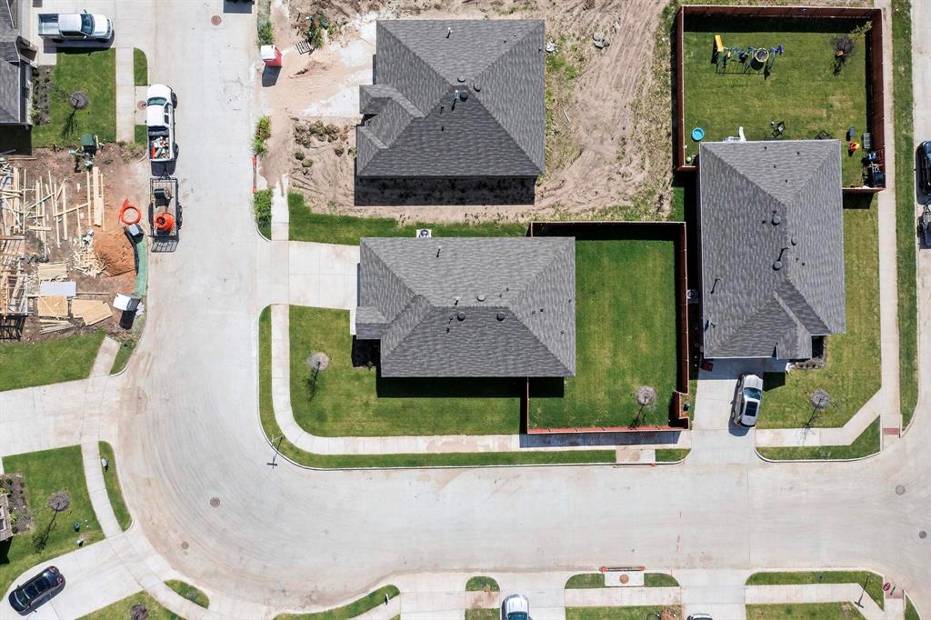 406 Regiment Road Sherman, TX 75090 - Photo 3 of 40 an aerial view of a house with swimming pool