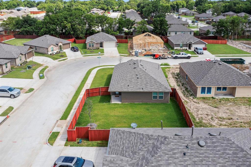 406 Regiment Road Sherman, TX 75090 - Photo 30 of 40 an aerial view of a house with swimming pool