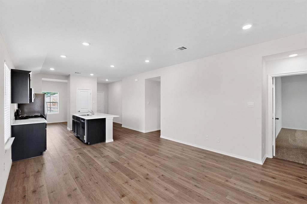 406 Regiment Road Sherman, TX 75090 - Photo 38 of 40 a view of kitchen with wooden floor and electronic appliances