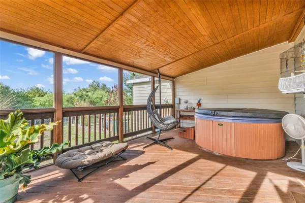 a outdoor view with sitting space and glass windows