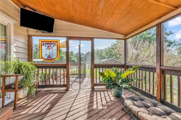a view of a chairs on the deck