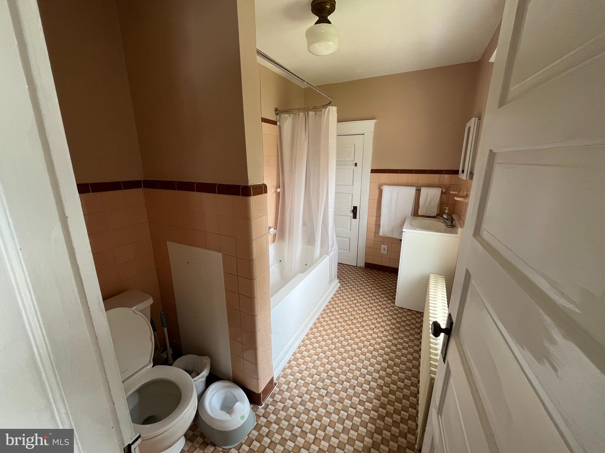 500 Delaware Avenue Delmar, DE 19940 - Photo 13 of 29 a bathroom with a sink and toilet