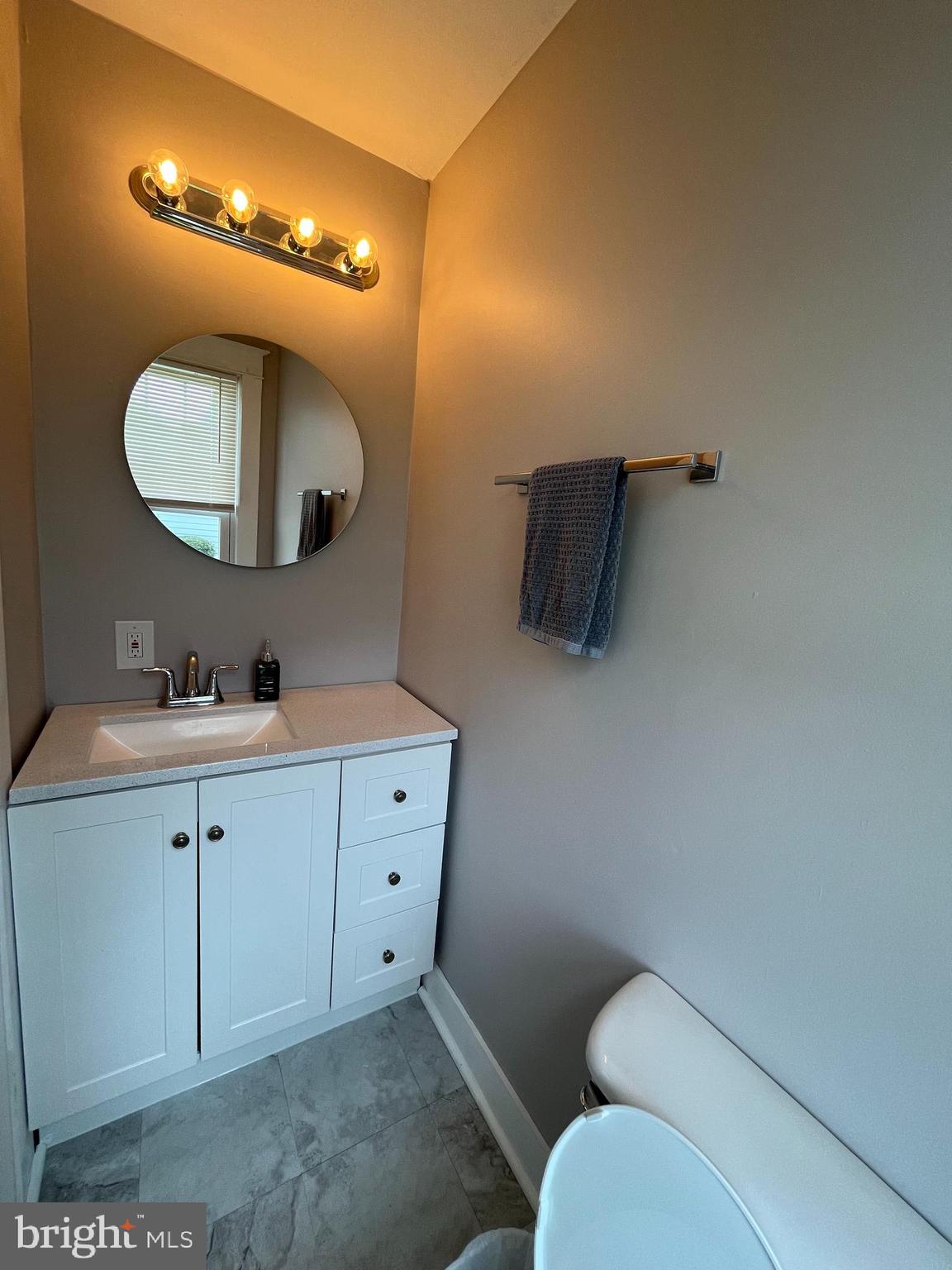 500 Delaware Avenue Delmar, DE 19940 - Photo 22 of 29 a bathroom with a toilet sink and mirror
