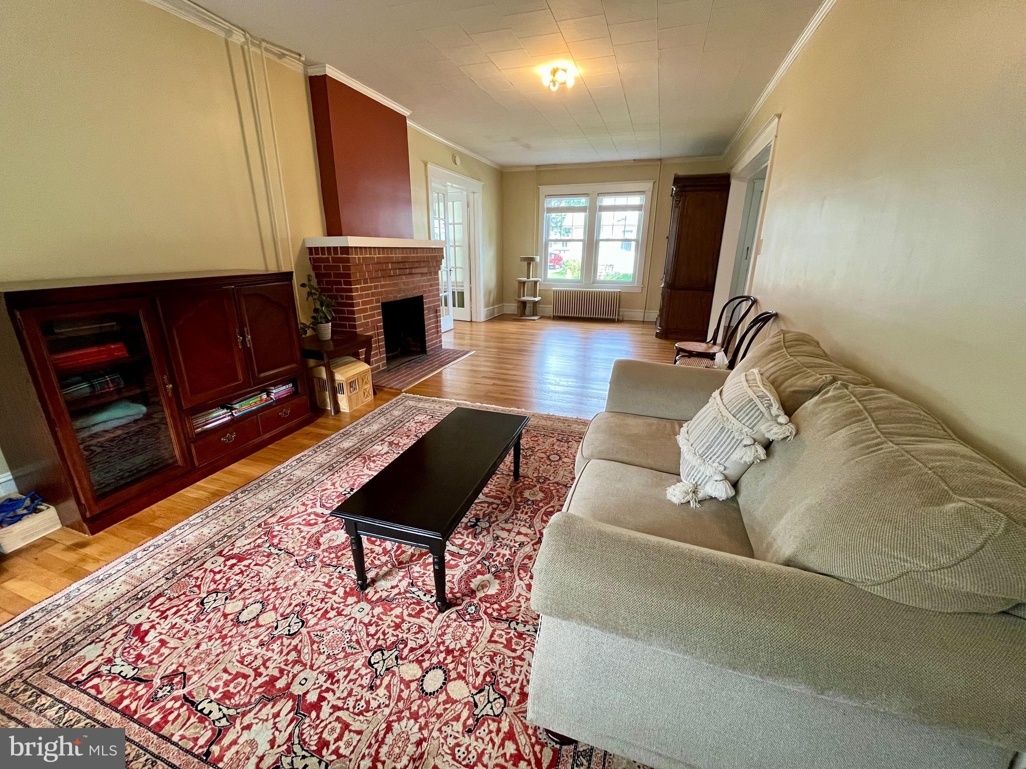 500 Delaware Avenue Delmar, DE 19940 - Photo 7 of 29 a living room with furniture and a fireplace