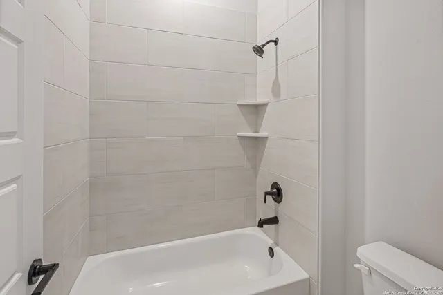 a bathroom with a bathtub