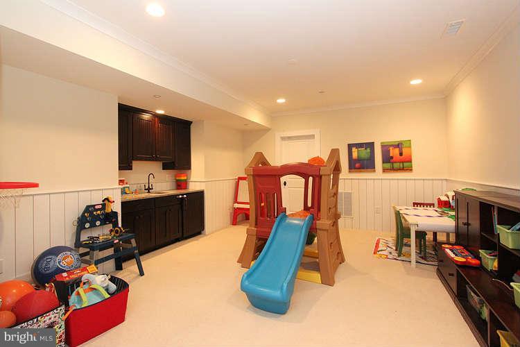 8015 Aberdeen Road Bethesda, MD 20814 - Photo 26 of 30 Play/Rec Room w/wet bar & cabinetry