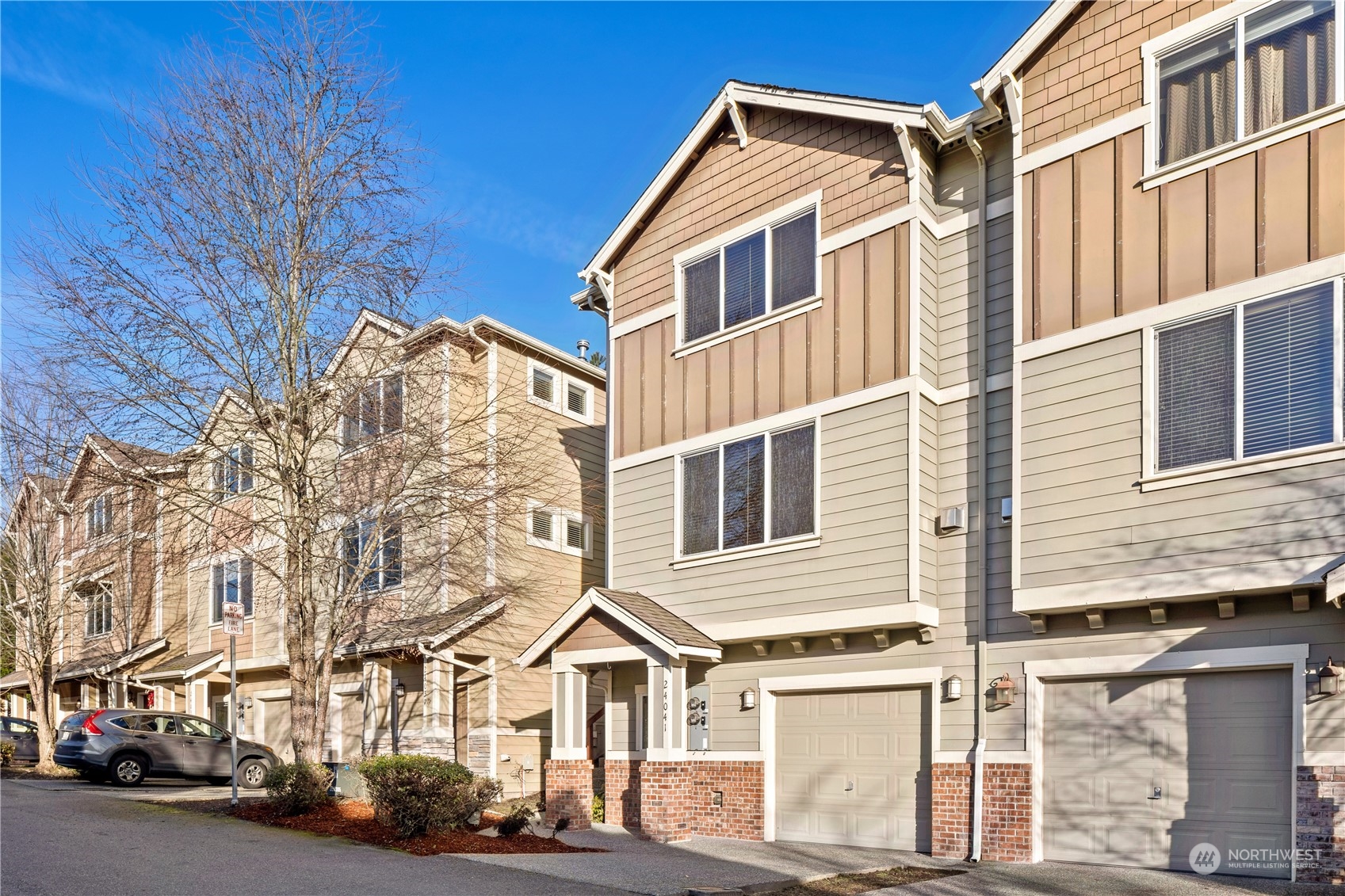 24041 40th Lane Southeast Bothell, WA 98021 - Photo 1 of 29 a view of a street with buildings