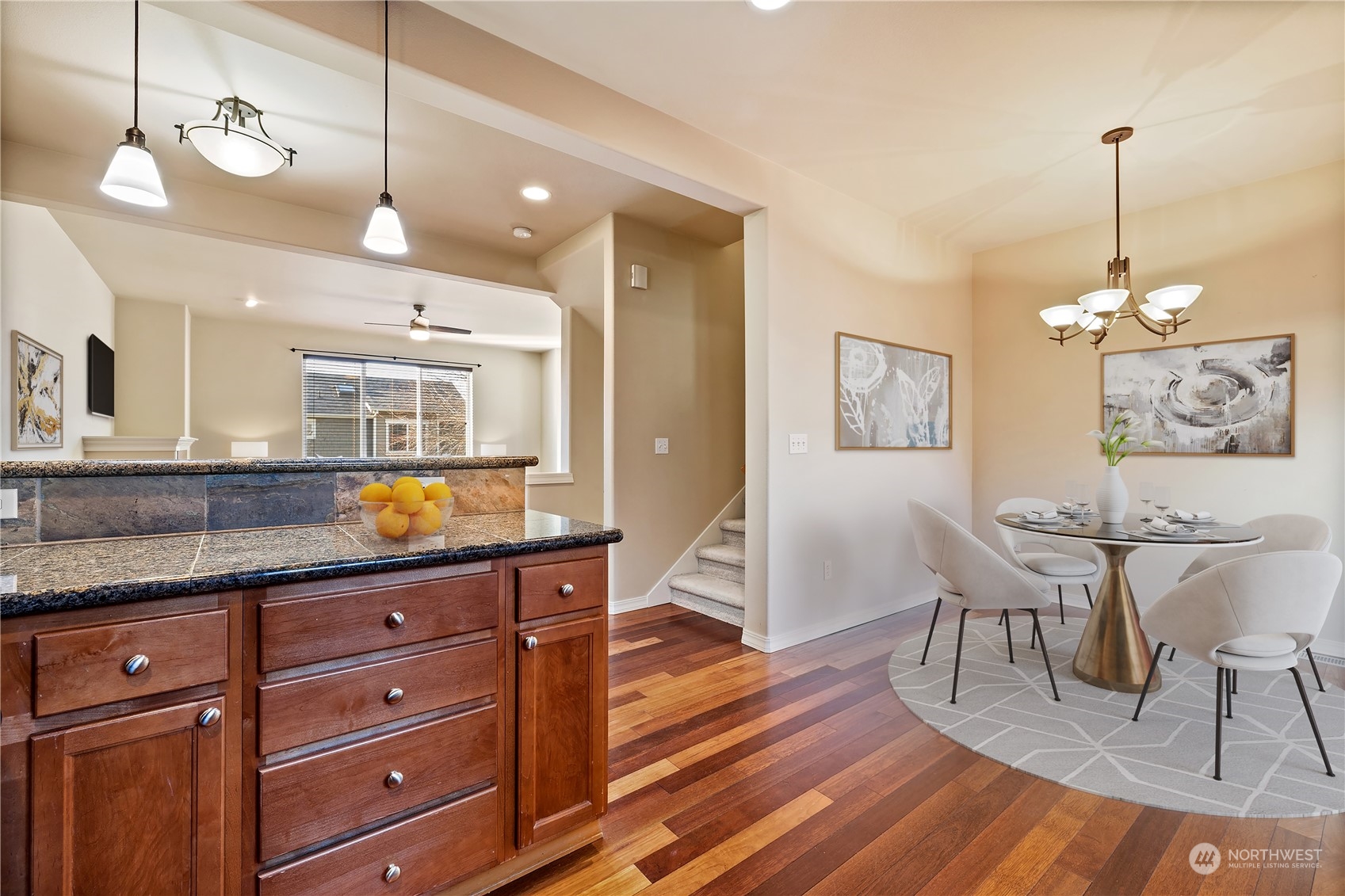 24041 40th Lane Southeast Bothell, WA 98021 - Photo 14 of 29 a view of a kitchen counter space wooden floor and furniture