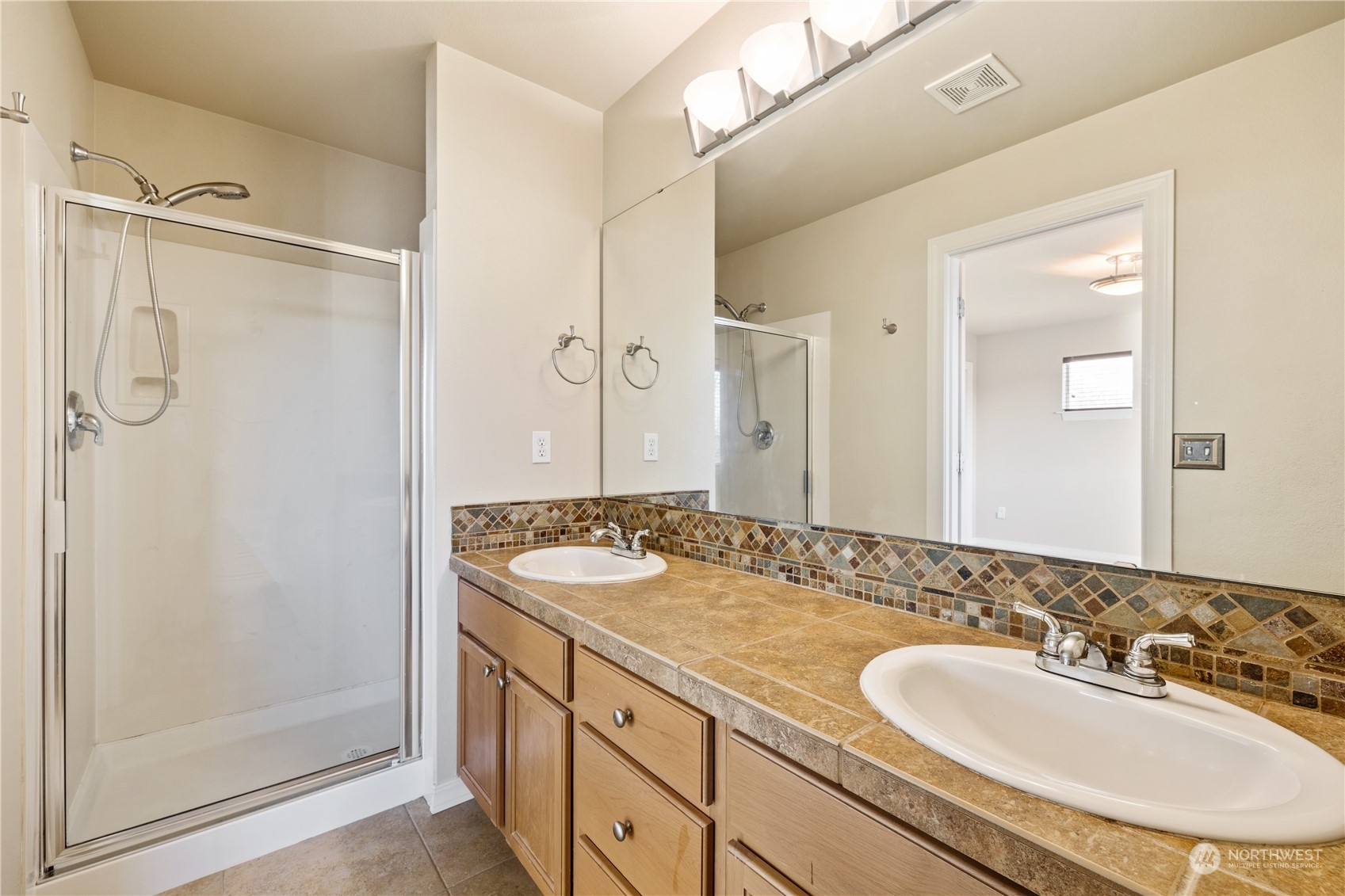 24041 40th Lane Southeast Bothell, WA 98021 - Photo 19 of 29 a bathroom with a sink and a mirror