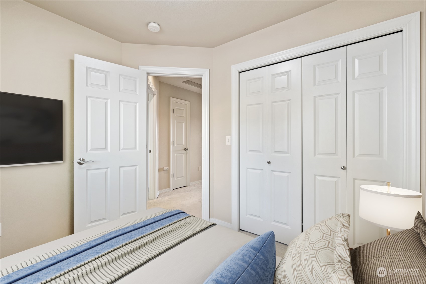 24041 40th Lane Southeast Bothell, WA 98021 - Photo 21 of 29 a bedroom with a bed and a tv on the dresser