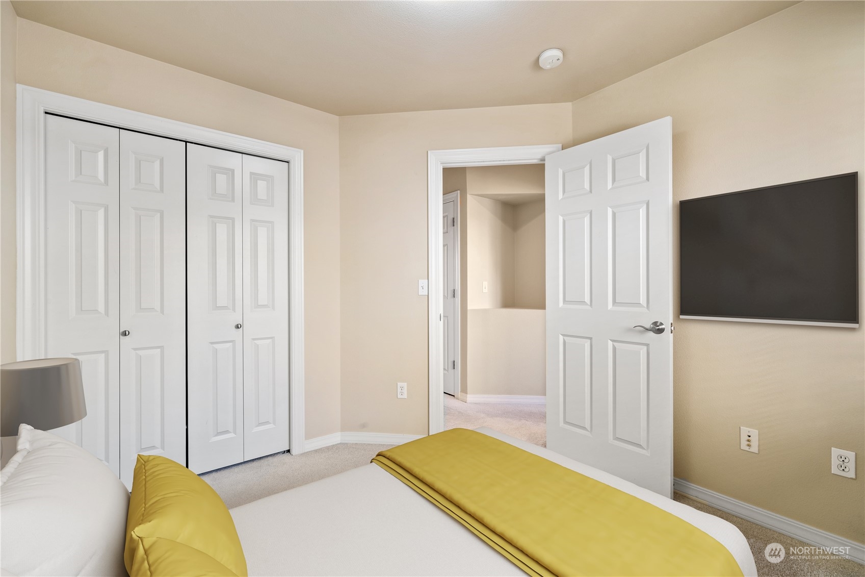 24041 40th Lane Southeast Bothell, WA 98021 - Photo 25 of 29 a bedroom with a bed and a flat screen tv