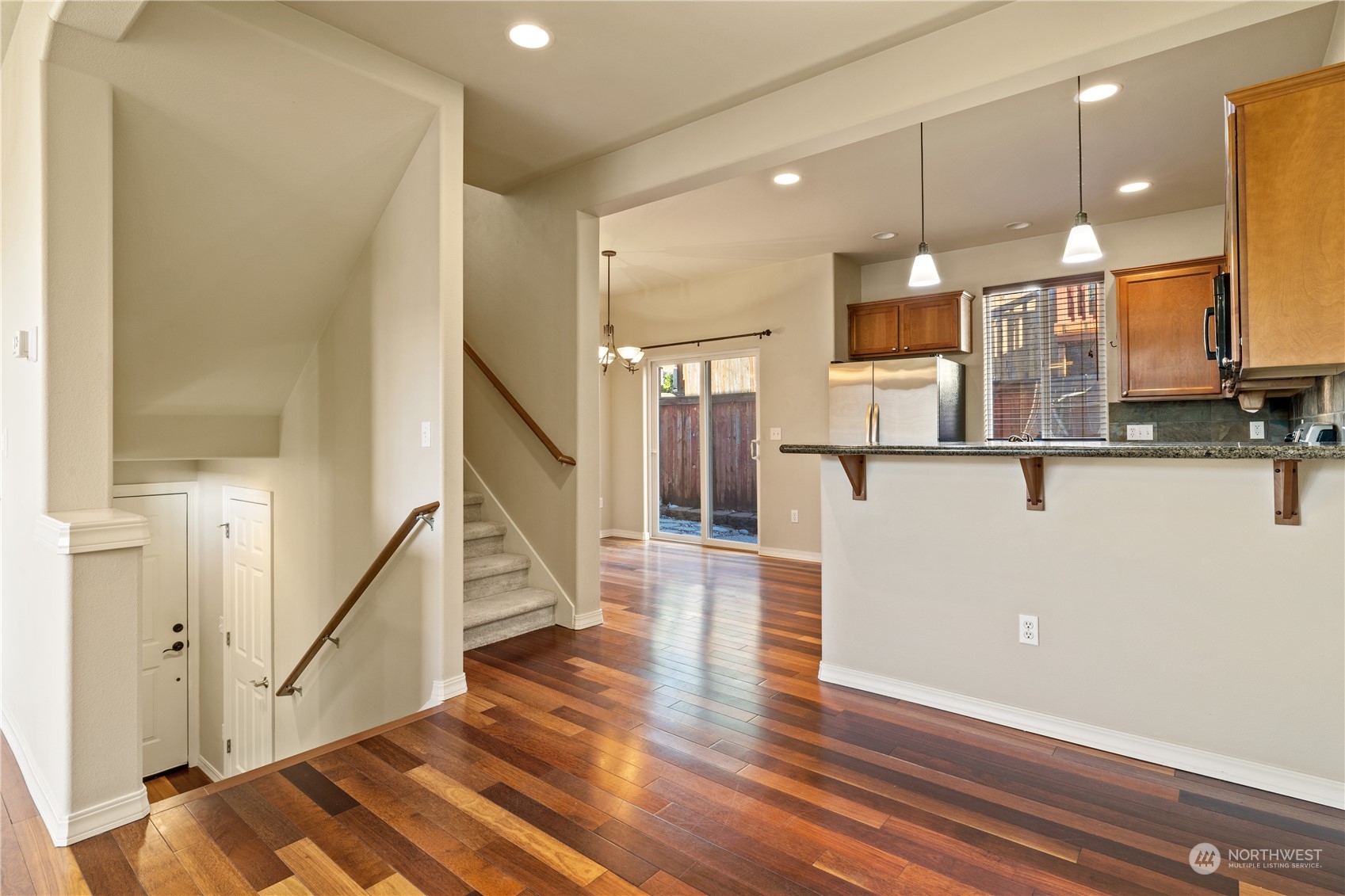 24041 40th Lane Southeast Bothell, WA 98021 - Photo 4 of 29 a view of a hallway with wooden floor and staircase
