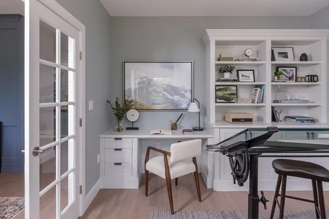 a bedroom with furniture and a window