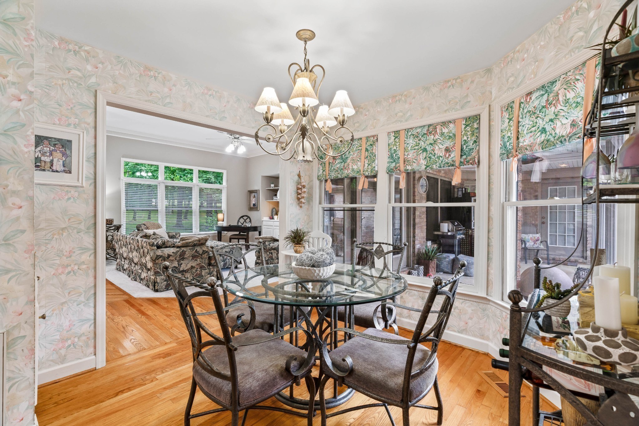 5544 South New Hope Road Hermitage, TN 37076 - Photo 14 of 62 a view of a dining room with furniture wooden floor and chandelier