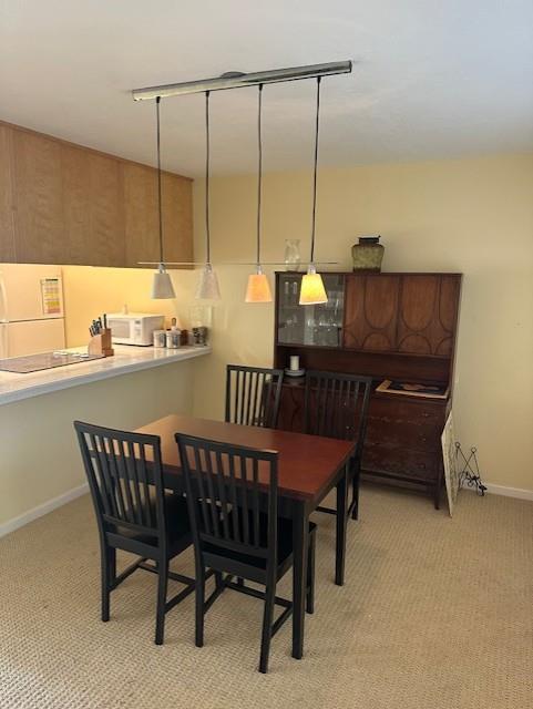 101 Shell Road, Unit 106 Watsonville, CA 95076 - Photo 14 of 16 a dining room with furniture and window
